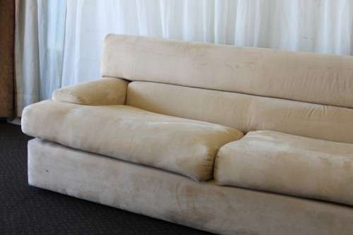 AN AWESOME TAN SUEDE FEEL LARGE 2-SEATER COMFORTABLE COUCH IN AWESOME CONDITION