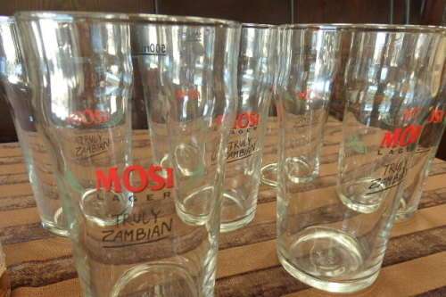 An amazing collection of ten assorted 500ml branded draught glasses - perfect for the bar!!!