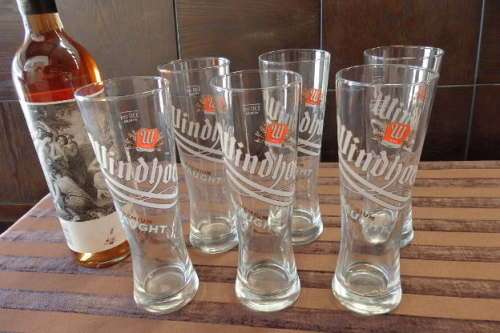**RS17** A wonderful collection of seven branded beer/ draught glasses in great condition