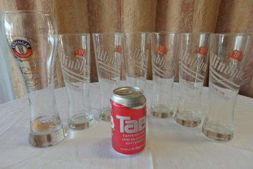 **RS17** A wonderful collection of seven branded beer/ draught glasses in great condition