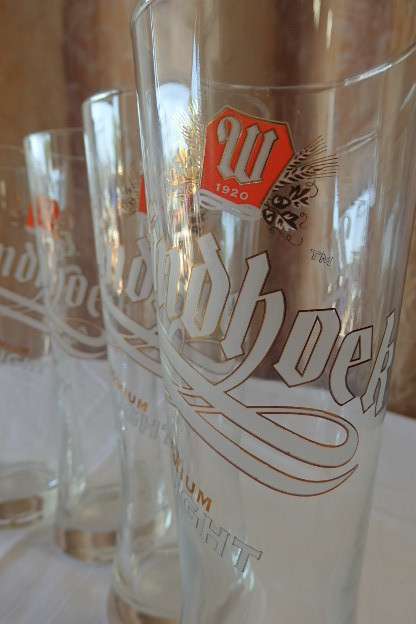 **RS17** A wonderful collection of seven branded beer/ draught glasses in great condition
