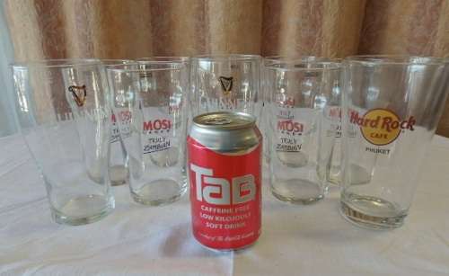 An amazing collection of ten assorted 500ml branded draught glasses - perfect for the bar!!!
