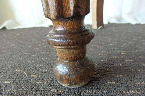 A SPECTACULAR ANTIQUE HAND CARVED SOLID OAK CAPTAINS CHAIR WITH "SHERATON" FLUTED TURNED LEGS
