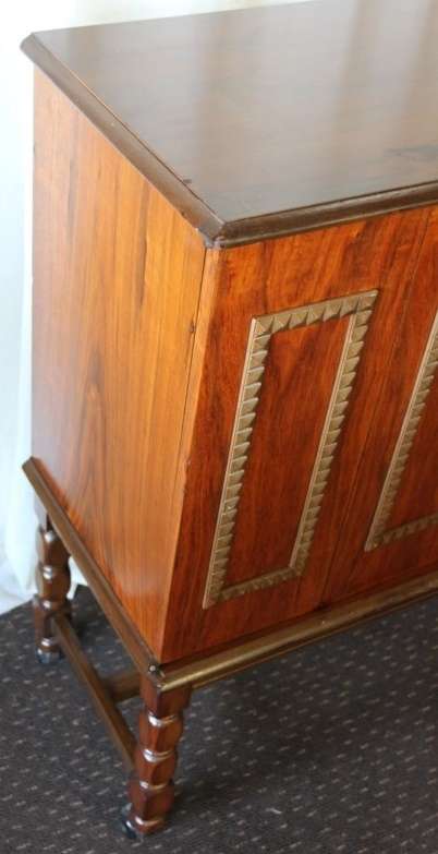 AN AMAZING RETRO (c1970's) WOODEN CABINET ON ITS ORIGINAL CASTORS WITH AWESOME RELIEF DETAILING