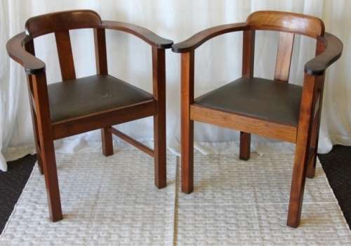 TWO STUNNING ANTIQUE SOLID TEAK CAPTAIN'S CHAIRS WITH PERIOD VINYL SEATS IN GOOD CONDITION bid/chair