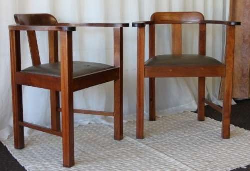 TWO STUNNING ANTIQUE SOLID TEAK CAPTAIN'S CHAIRS WITH PERIOD VINYL SEATS IN GOOD CONDITION bid/chair