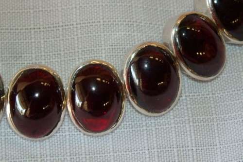 A FABULOUS BROAD CHUNKY SILVER LADIES BRACELET WITH TEN (LARGE) OVAL RED SARDONYX STONES