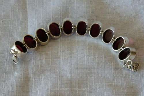 A FABULOUS BROAD CHUNKY SILVER LADIES BRACELET WITH TEN (LARGE) OVAL RED SARDONYX STONES