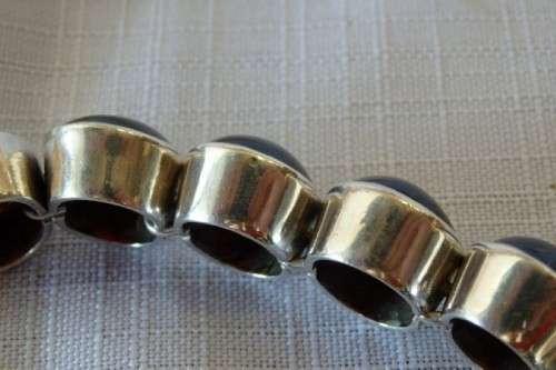 A FABULOUS BROAD CHUNKY SILVER LADIES BRACELET WITH TEN (LARGE) OVAL RED SARDONYX STONES