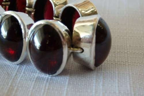 A FABULOUS BROAD CHUNKY SILVER LADIES BRACELET WITH TEN (LARGE) OVAL RED SARDONYX STONES
