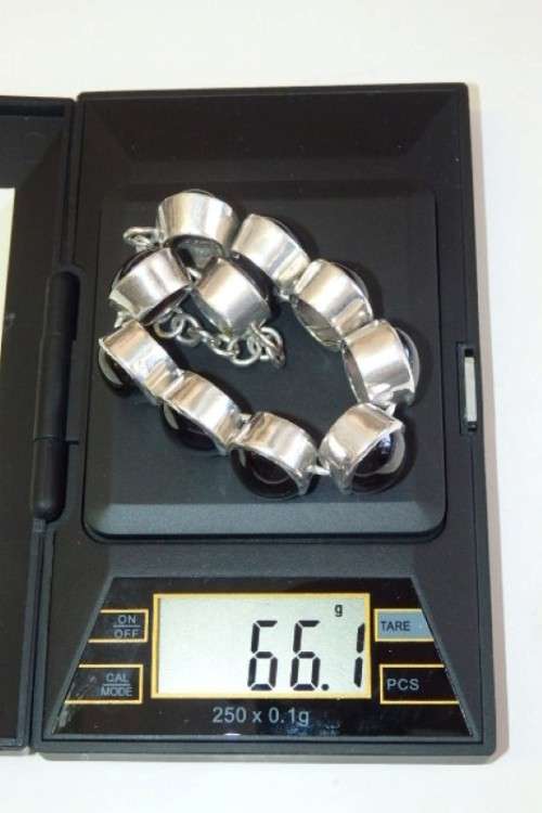 A FABULOUS BROAD CHUNKY SILVER LADIES BRACELET WITH TEN (LARGE) OVAL RED SARDONYX STONES