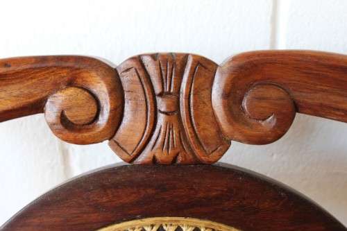 Two beautiful solid Stink Wood Ball & Claw occasional arm chairs with wicker backrests!!! bid/chair