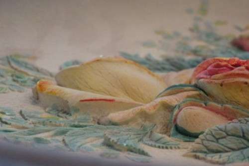 A beautiful signed hand-painted vintage 3D chalk-ware plaque of ''ROSES'' by W.H. Bossons RS17