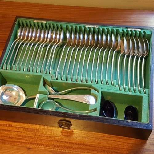 A spectacular antique Hallmarked sterling silver Walker & Hall boxed 12 place setting cutlery set