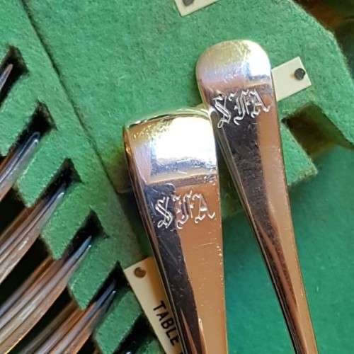 A spectacular antique Hallmarked sterling silver Walker & Hall boxed 12 place setting cutlery set