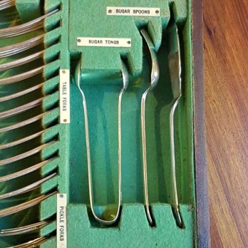 A spectacular antique Hallmarked sterling silver Walker & Hall boxed 12 place setting cutlery set