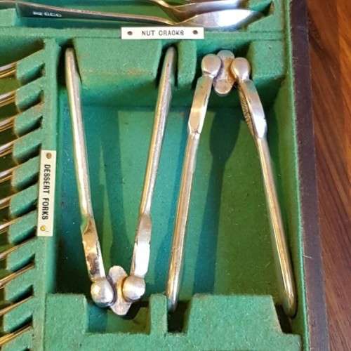 A spectacular antique Hallmarked sterling silver Walker & Hall boxed 12 place setting cutlery set