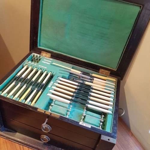 A spectacular antique Hallmarked sterling silver Walker & Hall boxed 12 place setting cutlery set