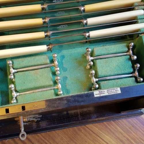 A spectacular antique Hallmarked sterling silver Walker & Hall boxed 12 place setting cutlery set