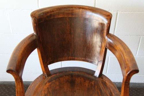 A gorgeous Edwardian antique oak fire house captain's chair with beautiful carved arm rests