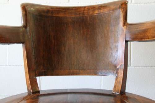 A gorgeous Edwardian antique oak fire house captain's chair with beautiful carved arm rests