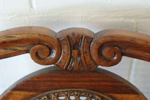 A beautiful solid Stink Wood Ball & Claw parlour couch with wicker backrest in great condition!!!