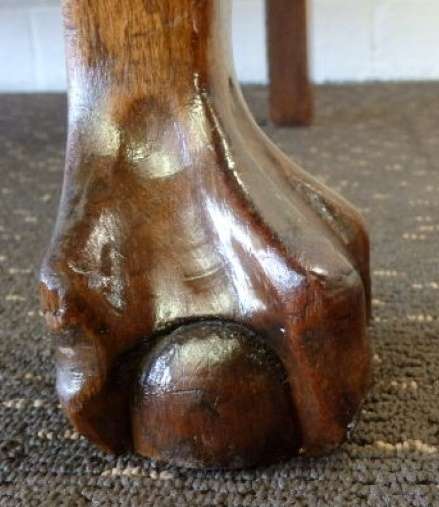 A beautiful solid Stink Wood Ball & Claw parlour couch with wicker backrest in great condition!!!