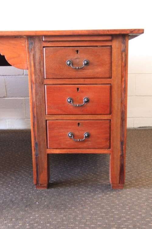 A magnificent large solid oak partners desk with loads of drawer space and ornate handles