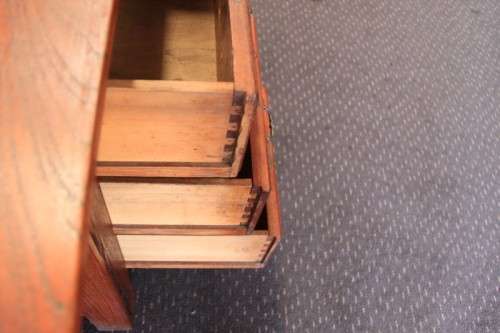 A magnificent large solid oak partners desk with loads of drawer space and ornate handles