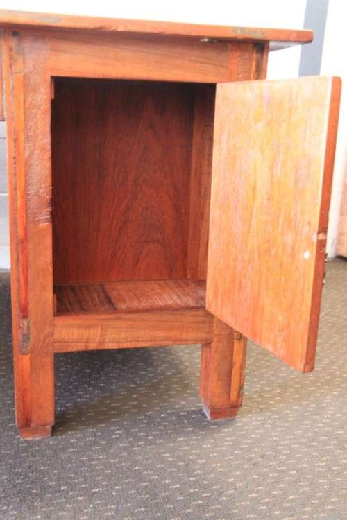 A magnificent large solid oak partners desk with loads of drawer space and ornate handles