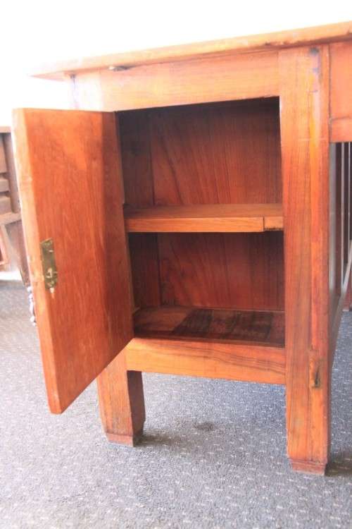 A magnificent large solid oak partners desk with loads of drawer space and ornate handles