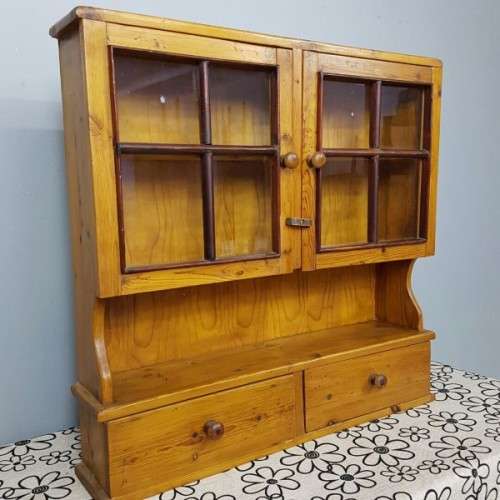 An exquisitely made antique solid Oregon wall mounting display cabinet with Imbuia detailing