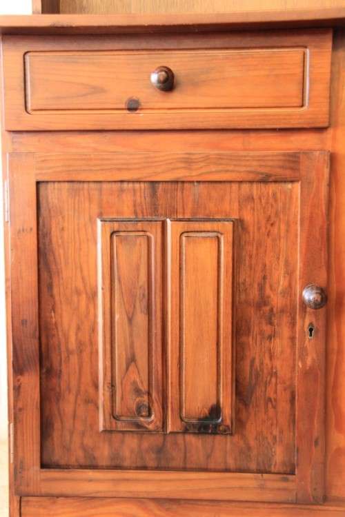 A stunning teak buffet server w/ two display shelves and ample storage space in remarkable condition