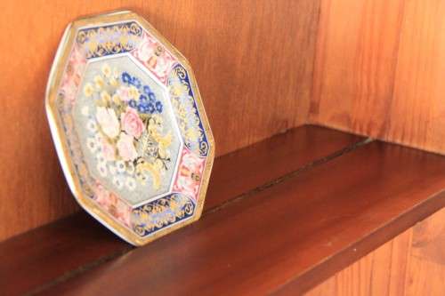 A stunning teak buffet server w/ two display shelves and ample storage space in remarkable condition