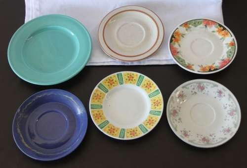 A beautiful collection of assorted porcelain & ceramic saucers & small plates in good condition!!!
