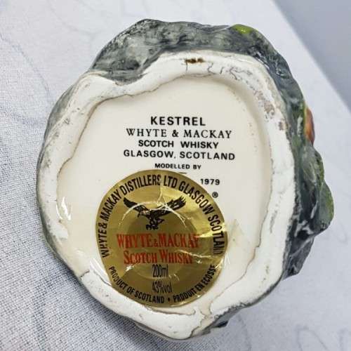 A rare sealed vintage Royal Doulton "Whyte & Mackay Scotch Whiskey" "Kestrel" porcelain decanter