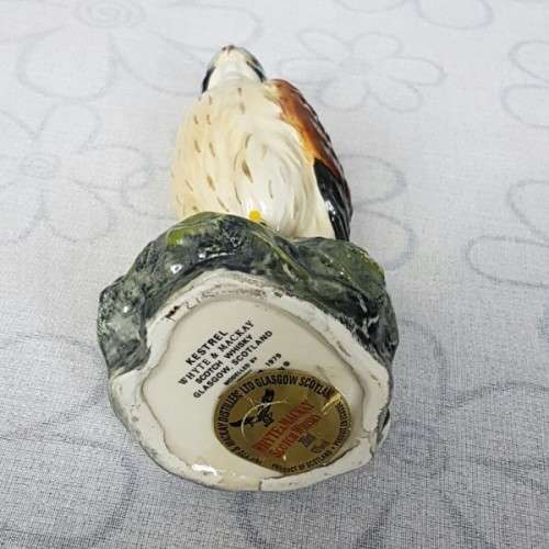 A rare sealed vintage Royal Doulton "Whyte & Mackay Scotch Whiskey" "Kestrel" porcelain decanter
