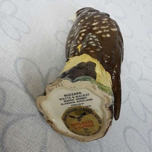 A "SEALED" rare vintage Royal Doulton "Whyte & Mackay Scotch Whiskey" "Buzzard" porcelain decanter