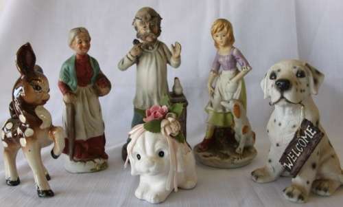 A beautiful job-lot of assorted ceramic figurines including a porcelain deer, puppy and more
