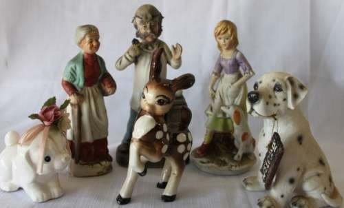 A beautiful job-lot of assorted ceramic figurines including a porcelain deer, puppy and more