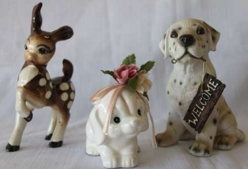 A beautiful job-lot of assorted ceramic figurines including a porcelain deer, puppy and more