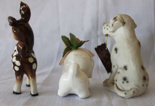 A beautiful job-lot of assorted ceramic figurines including a porcelain deer, puppy and more