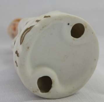 Two wonderful ceramic figurines of an a farmer and his wife with hand painted detailing bid/figurine