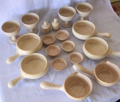 A beautiful job-lot of assorted stoneware crockery including soup bowls, boats, goblets and more