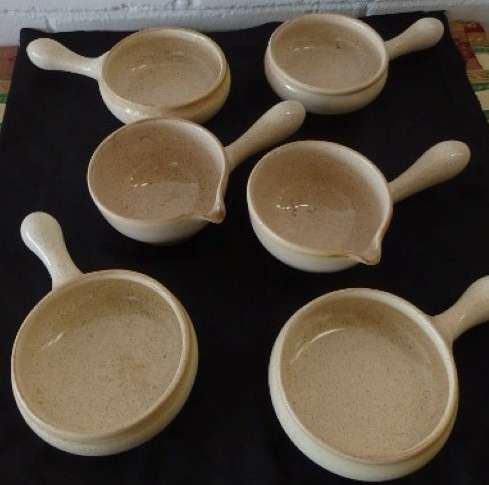 A beautiful job-lot of assorted stoneware crockery including soup bowls, boats, goblets and more