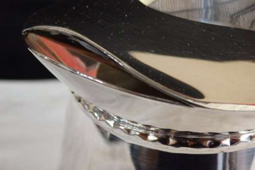 An awesome silver plated water jug/ pitcher with an ice lip in fabulous condition