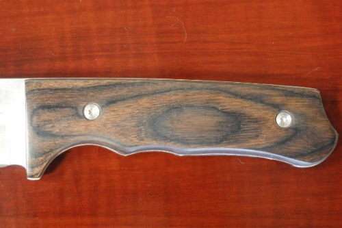 An amazing "full tang" hunting knife with knife sheath and belt slot in near mint condition