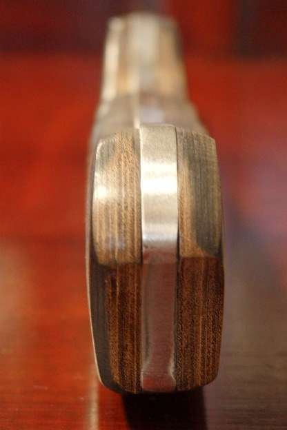 An amazing "full tang" hunting knife with knife sheath and belt slot in near mint condition