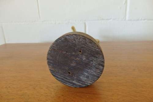 An incredible (tall) solid brass abstract figurine on a wooden stand in stunning condition