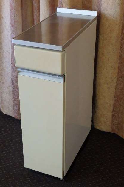 An awesome vintage "Retro" multi-purpose single door metal cabinet with a stainless steel top